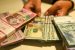 Pelemahan Rupiah Dan Eskalasi Perang Dagang